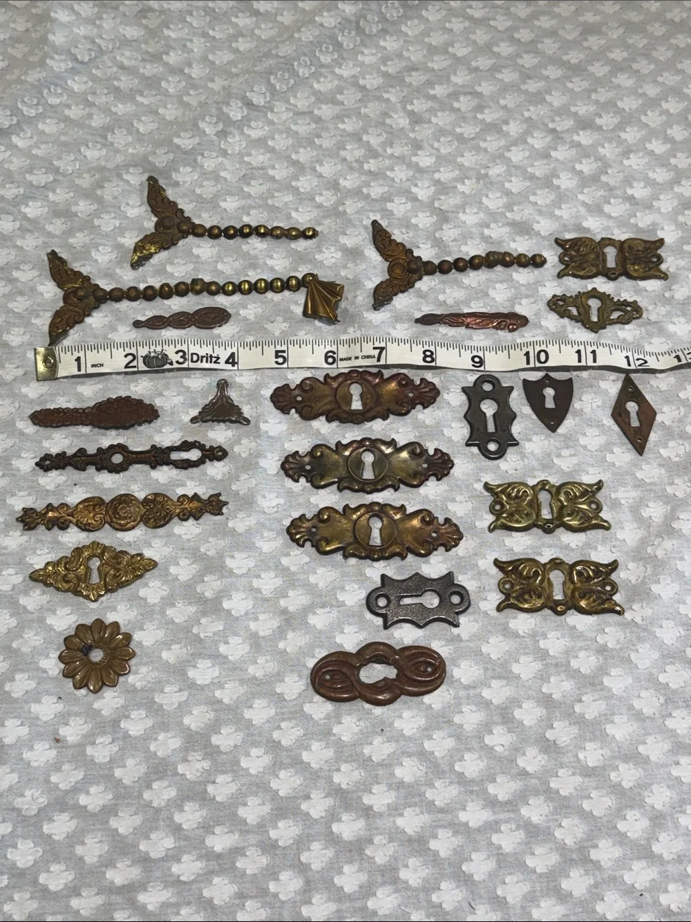 Lot of Vintage Decorative Keyhole Escutcheons and metal decor pieces